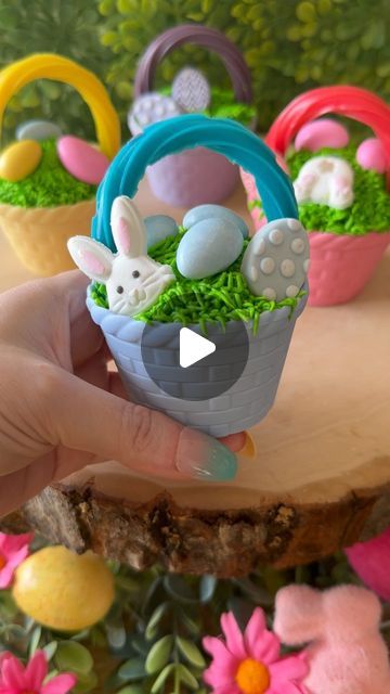 Jamie Kirchner | Holiday Inspo on Instagram: "Easter Basket Cupcakes

#ad These adorable Easter basket cupcakes were made with @michaelsstores silicone basket cupcake liners and candy decorations. 

What you’ll need:
💚 grass piping tip
🧺 @michaelsstores basket liners 
💗 @michaelsstores pastel jordan almonds 
🐰 @michaelsstores eggs & bunny candy decorations 

Fill basket cupcake liners halfway with desired cake mix. Place on sheet pan and bake at 350F for 20 minutes. Once cool ice with green frosting using a grass piping tip. Add color candy twizzler to the top of the basket to create a handle. Decorate with @michaelsstores pastel jordan almonds, egg and bunny candy decorations. 

For more fun baking supplies follow @michaelsstores and share how you #MakeItWithMichaels #MichaelsMakers # Grass Piping Tip, Basket Cupcakes, Easter Basket Cupcakes, Green Frosting, How To Make Candy, Jordan Almonds, Color Candy, Holiday Inspo, Candy Decorations