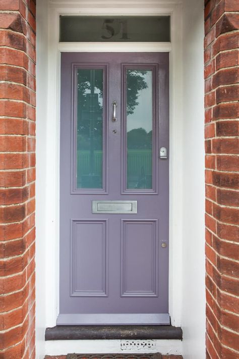 Colorful Painted Door Ideas - Front Door Paint Colors | Apartment Therapy Red Brick Purple Door, Lilac Doors Front House, Violet Front Door, Mauve Door Exterior, Purple Front Door Red Brick, Purple Front Door Paint Colors, Green House Purple Door, Pastel Front Door, Lilac Front Door