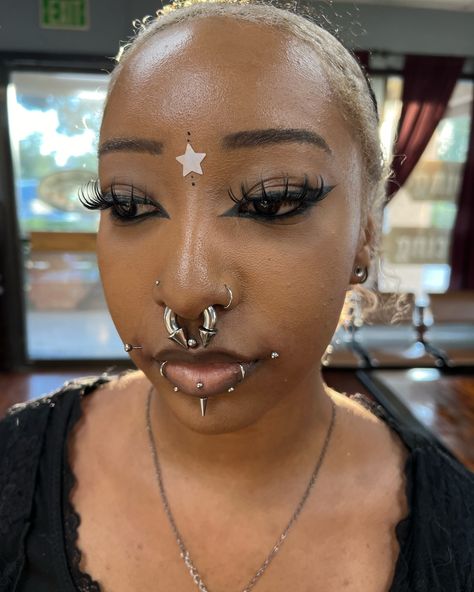 #dahlia piercing 🏹 with lots of room for swelling that will be downsized in just a few weeks! she looks stunning!! super happy for the trust to add onto her set up 👁️‍🗨️ Double Ashley Piercing, Facial Piercings Black Women, Dahlia Bites Piercing, Dalia Bites Piercing, Black Eyebrow Piercing, Face Piercings Black Women, Face Piercings Medusa, Snakebite Piercing, Monroe Piercing