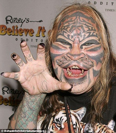 Dennis Avner, also known as the Stalking Cat, was a Nevada man famed for his extreme body ... Extreme Body Modification, Wierd People, Human Oddities, Epic Tattoo, Bad Tattoos, Body Modification, Body Modifications, Foot Tattoos, Crazy People