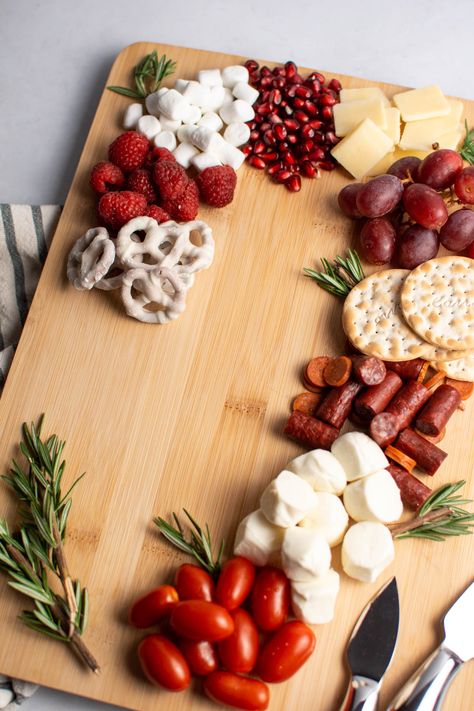 Candy Cane Charcuterie Board - The Ashcroft Family Table Candy Cane Charcuterie Board, Candy Cane Charcuterie, Caprese Board, Red And White Party, Christmas Hosting, White Chocolate Covered Pretzels, Water Crackers, Easy Candy, Snack Bites