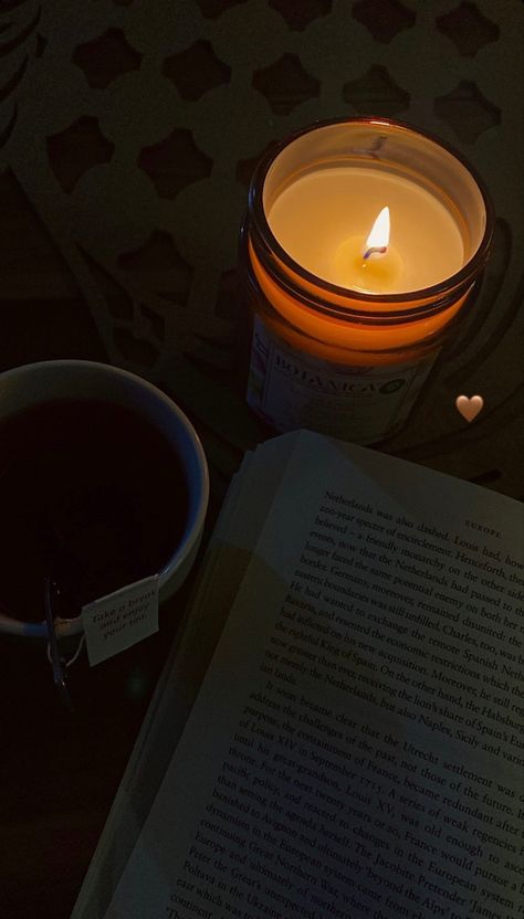 Rainy Day Book Aesthetic, Light Candle Aesthetic, Tea Fall Aesthetic, Fall Tea Aesthetic, Book And Candle Aesthetic, Cozy Fall Aesthetic Wallpaper Simple, Tea Book Aesthetic, Cozy Tea Aesthetic, Cozy Night In Aesthetic