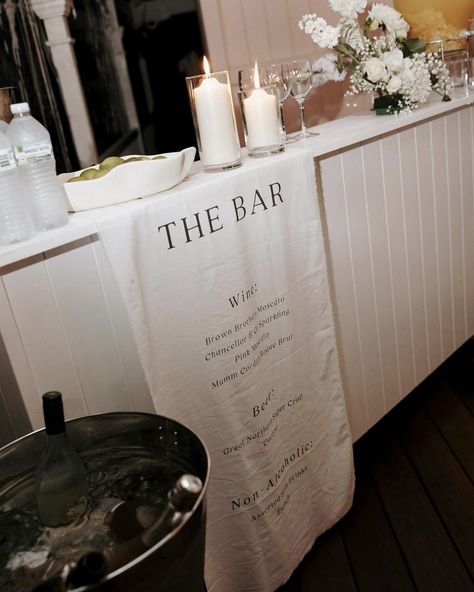 Fabric Bar Sign 🥂 Perfectly draped - makes a beautiful statement piece to match your welcome sign and seating chart. ✨ Send us your design or inspiration and we can personalise it to make it your own. Welcome Wedding Sign Fabric, Self Serve Bar Sign, Espresso Bar Wedding, Fabric Bar Sign, Bridal Sweet Room Ideas, Linen Bar Sign, Modern Seating Chart Wedding, Fabric Welcome Sign, Welcome Sign And Seating Chart