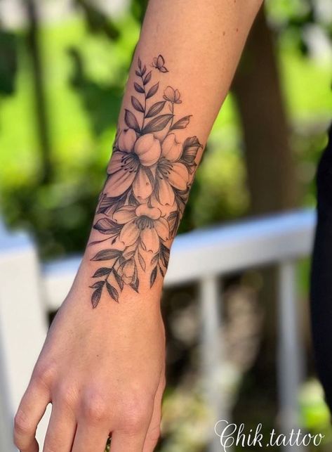 Violet Flower Tattoos, Lower Arm Tattoos, Around Arm Tattoo, Wrap Around Tattoo, Cuff Tattoo, Wrap Tattoo, Girl Arm Tattoos, Flower Wrist Tattoos, Inspired Tattoos