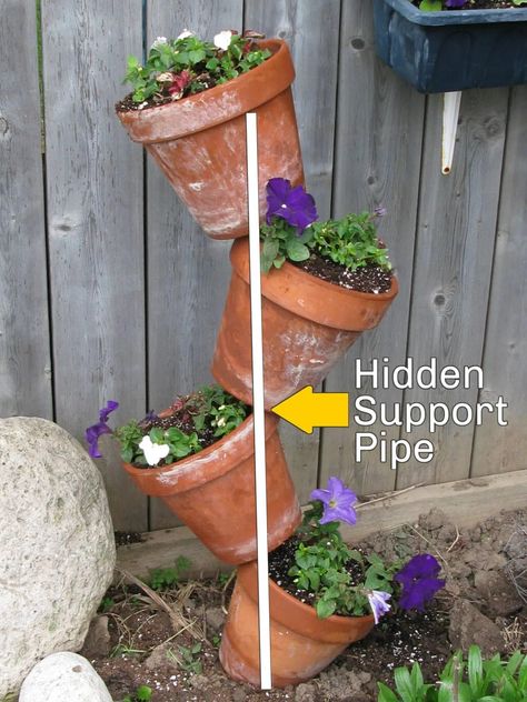 Tipsy Plant Tower, Tipsy Pots Planters Diy, Tipsy Turvy Planter, Topsy Turvy Planter, Flower Pot Tower, Stacked Flower Pots, Vertical Container Gardening, Tiny Gardens, River Rock Garden