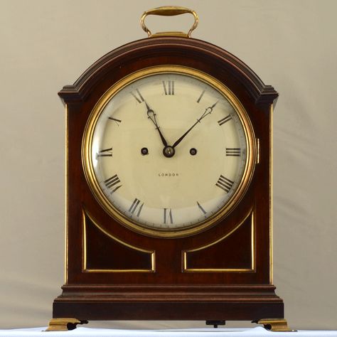 Antique English Regency bracket clock in mahogany arch top case with 8" convex painted dial and two train fusee, eight day movement with bell strike movement, circa 1840. No warranty. Antique Mantle Clock, English Antiques, Mantle Clock, Antique Clocks, Wood Case, English Style, Tag Sale, Vintage Clock, Mantel Clock