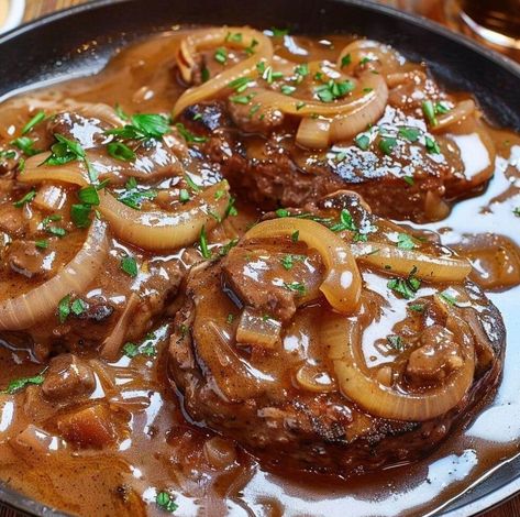 Enjoy a classic comfort dish with this Salisbury Steak recipe, featuring juicy beef patties smothered in a rich and savory onion gravy. Perfect for a hearty dinner that will satisfy the whole family! Ingredients: Directions: Enjoy your classic and hearty Salisbury Steak with Onion Gravy! Skillet Salisbury Steak, Smothered Beef Patties, Salisbury Steak In Oven, Best Salisbury Steak Recipe With Mushroom-onion Gravy, Chopped Sirloin Patties Recipe, Salisbury Steak Recipe Easy Stove Top, Salisbury Steak Recipe Pioneer Woman, Beef Salisbury Steak, Salisbury Steak And Gravy