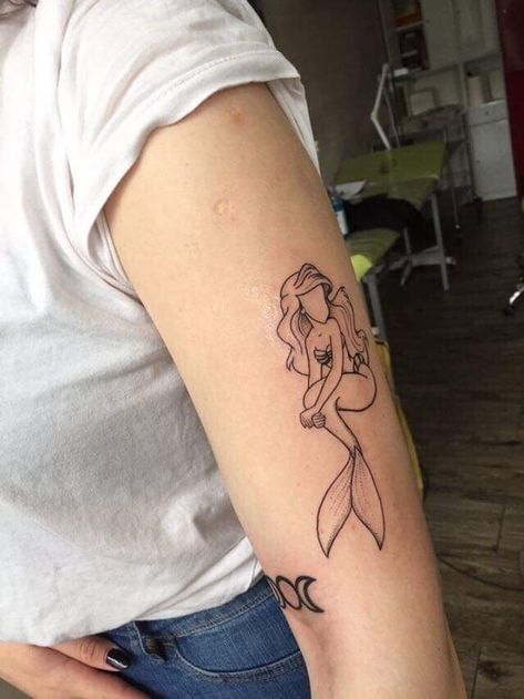 Ariel Mermaid Tattoo, Encanto Tattoo, Mermaid Fin Tattoo, Ariel Tattoo Design, Disney Princess Tattoos For Women, Ariel Silhouette Tattoo, Simple Ariel Tattoo, Ariel Tattoo Ideas, The Little Mermaid Tattoo