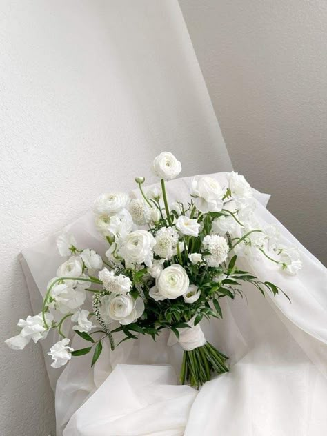 Unique White Flower Bouquet, Dainty White Bouquet, White Bride Bouquet With Greenery, White And Green Spring Bouquet, White Bouquets For Bridesmaids, Wedding Bouquets White And Green Simple, Simple White And Green Bridal Bouquet, Ranaculus Bouquet White, Green White Bridal Bouquet