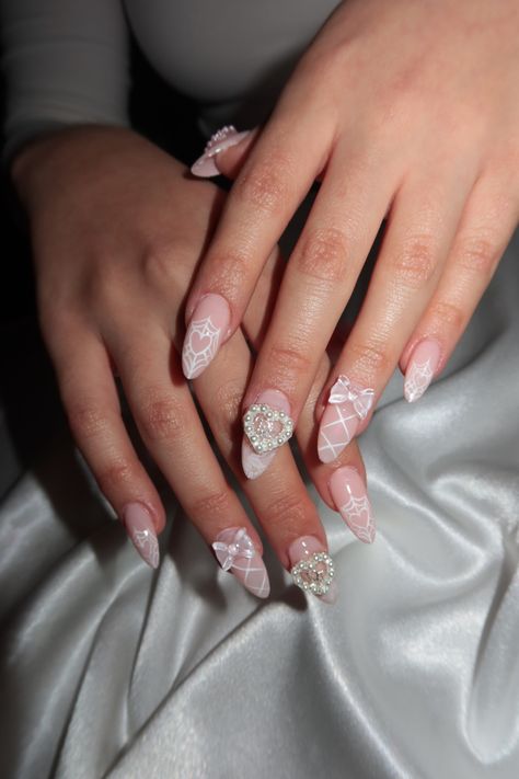 Coquette Nails With Charms, Pink Coquette Nails Almond, Coquette Nails Acrylic Almond, Nails With Charms Pink, Almond Nails Charms, Nails With Heart Charms, Nails Acrylic With Charms, Almond Nails With Charms, Nail Inspo Charms