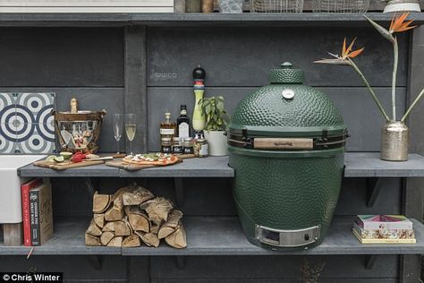 Star of the show is a large version of the Big Green Egg cooker — a ceramic cooker based o... Bbq Kitchen Outdoor, Green Egg Accessories, Big Green Egg Accessories, Big Green Egg Outdoor Kitchen, Bbq Aesthetic, Big Green Egg Table, Green Egg Bbq, Kitchen Backyard, Outdoor Bbq Area