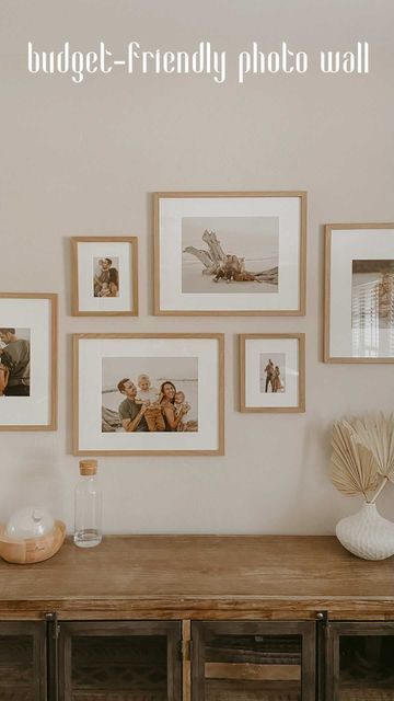 Light Wood Frames On Wall, Small Wall Family Picture Ideas, Simple Family Photo Display, Natural Wood Gallery Wall, Gallery Wall Oak Frames, Wood Frame Photo Wall, Light Wood Gallery Wall, Japandi Picture Frames, Wall Of Photo Frames