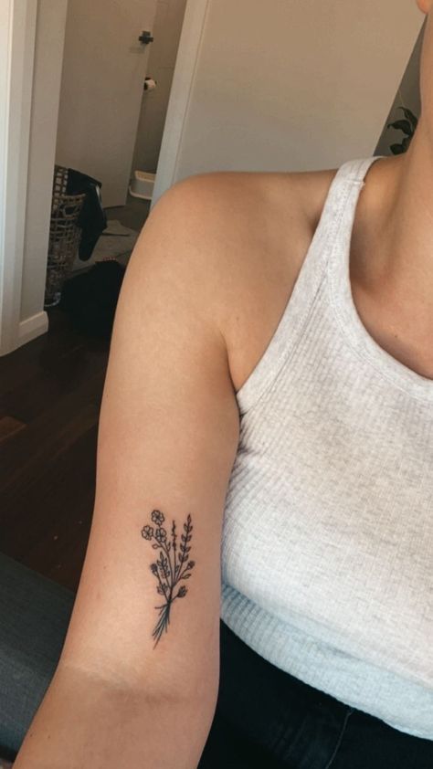 Single Larkspur Flower Tattoo, Minimalist Dainty Tattoo, Top Of Bicep Tattoo, Small Flower Arm Tattoo, Wildflower Tattoo Placement, Flower Tattoo On Bicep, Flower Arm Tattoos For Women Forearm, Bicep Flower Tattoo Women, Flower Tattoo Placement For Women