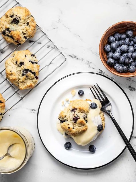 Fresh blueberries, tangy lemon curd, creamy homemade whipped cream, and fluffy biscuits make these Blueberry Lemon Curd Shortcakes a totally epic dessert! BudgetBytes.com Blueberry Lemon Curd, Blueberry Biscuits, Fluffy Biscuits, Vanilla Whipped Cream, Homemade Whipped Cream, Baking Project, Homemade Vanilla, Frozen Blueberries, Freezer Friendly