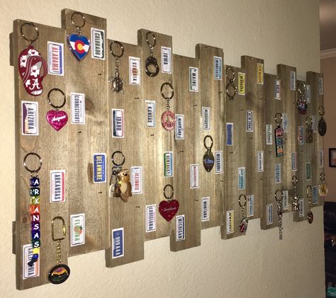 My husband is a trucker and likes to bring a souvenir keychain home from each state he has traveled to for our daughter. I wanted her to have a keepsake of her daddy’s travels, so I created my own design. She loves it, and she will be able to collect and display the 48 states he will someday travel to. (He won’t be driving to Alaska or Hawaii, so only 48 of the 50 states are displayed.) Travel Keychain Collection Display, Keychain Collection Display Ideas, Keychain Collection Display, Travel Collection Ideas, Keychain Display Ideas, Display Stickers, Ticket Display, Sticker Display, Souvenir Keychain