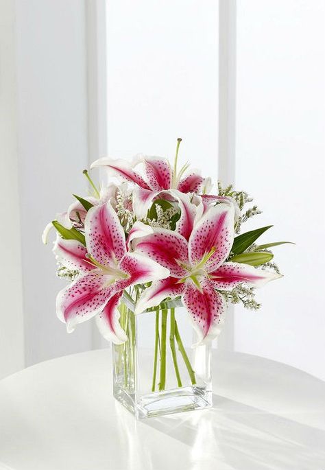 Lilies vase arrangement Stargazer Lily Flower Arrangements, Lily Flower Arrangements Vase, Lily Arrangement Vase, Lilly Arrangements, Lilly Flower Arrangements, Lily Flower Arrangements, Lilies In Vase, Pink Lily Bouquet, Stargazer Lily Bouquet