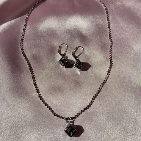 Ball chain Dice Necklace Bundle🎲 Includes a dice charm necklace and matching drop earrings with cubic zirconia details! Shop the look babes👇🏼✨  https://depop.app.link/tM4k5Cc9p4 Dice Necklace, Shop The Look, Ball Chain, Out Of Style, Charm Necklace, Cubic Zirconia, Going Out, Chain Necklace, Drop Earrings