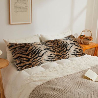 MATERIAL: high quality shaggy faux fur reverse to ultra soft matching crystal velvet, this fuzzy animal print body pillow cover will give you an extreme luxury. Passed the OEKO-TEX certification, no fading, no shedding and no pilling, skin friendly and pet friendly. AMIPOR | AMIPOR 20X54 Fluffy Body Pillow Cover, Tiger Print Plush Fuzzy Faux Fur Body Pillowcase w / Zipper | 54" H X 20" W X 2" D | Wayfair Tiger Print Bedding, Tiger Room Decor, Leopard Print Home Decor, Leopard Print Bedroom Ideas, Cheetah Bedroom Ideas, Room Shuffles, Tiger Bedroom, Cool Apartment Decor, Tiger Bedding