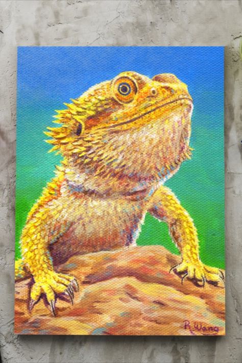 This is my very first lizard pet portrait painting, a bearded dragon named Koda. It was completed on October 23, 2020. It is painted on a 5″ x 7″ stretched canvas with acrylic paints. It was challenging to paint such a detailed portrait on such a small canvas. Rather than focus on all the tiny details and trying to paint every scale, I instead gave the impression of scales by layering the paint, and using tones, highlights and shadows to give depth and detail. Rebecca Wang Art. Dragon Portrait, Dragon Painting, Pet Portrait Painting, Dragon Drawing, Bearded Dragon, Bear Stuffed Animal, Colorful Paintings, Wildlife Art, A Rock