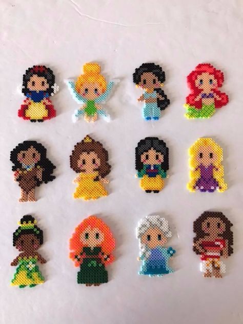 Disney Princesses made out of Pearler Beads #disney #dapperday #disneystyle #disneyfashion #disneybound Hama Beads Disney, Hamma Beads Ideas, Easy Perler Bead Patterns, Melty Bead Patterns, Pearl Beads Pattern, Easy Perler Beads Ideas, Fuse Bead Patterns, Art Perle, Hama Beads Design