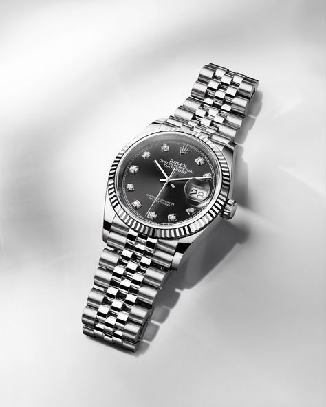 The Datejust 36 in a white Rolesor version – combining Oystersteel and white gold – with a bright black dial adorned with diamond-set hour markers. Trendy Watches Women, Cartier Watches Women, Rolex Wrist Watch, Watches Women Black, Rolex Watches Women, Trendy Watches, Swiss Luxury, Gold Watches Women, Watches Luxury