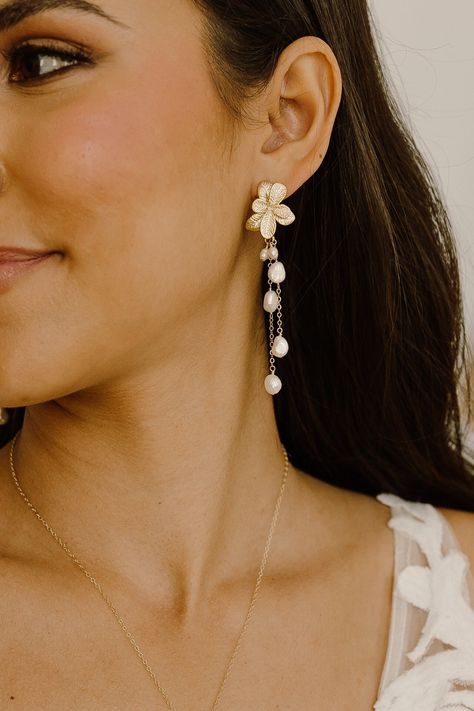 Our Gigi Pearl Earrings are the perfect combination of boho and bridal styles! These stunning earrings feature multiple delicate pearl drops that dangle elegantly from flower posts, making them the perfect addition to any wedding or special occasion outfit. These Earrings boast a dainty and elegant design that is sure to turn heads. The wire-wrapped pearls add a touch of sophistication and glamour to these already stunning earrings. Whether you're the bride-to-be or a guest, these earrings are s Wedding Guest Earrings, Pearl Dangle Earrings Wedding, Boho Bridal Earrings, Pearl Drop Earrings Bridal, Earrings Pearl Drop, Bridal Styles, Occasion Outfit, Prom Accessories, Bridal Earrings Pearl