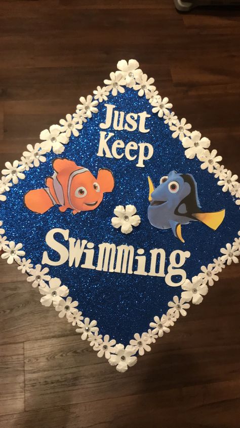 College graduation cap, just keep swimming, Finding Nemo, Nursing cap Graduation Cap Designs Finding Nemo, Finding Dory Graduation Cap, Just Keep Swimming Grad Cap, Finding Nemo Graduation Cap, Nemo Graduation Cap, Cartoon Graduation Cap, Taekwondo Quotes, Diy Graduation Decorations, Graduation Nursing