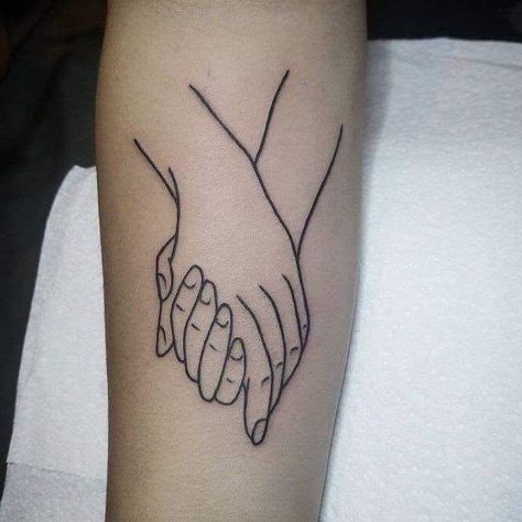 Holding Hands Tattoo, Small Holding, Minimalist Tattoo Meaning, Hands Tattoo, Typography Tattoo, Tattoo Minimalist, Delicate Tattoo, Disney Tattoo, Tiny Tattoo