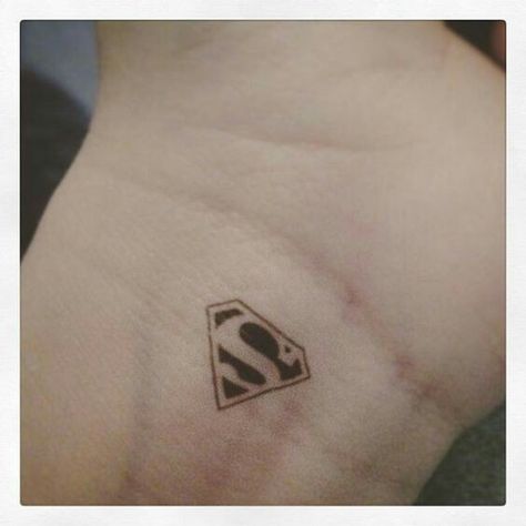 Superman Tattoo, Superman Tattoos, Small Rib Tattoos, Black Superman, Flame Tattoos, Marvel Tattoos, Small Wrist Tattoos, Wrist Tattoos For Women, Rib Tattoo