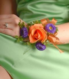 Wedding Corsages For Mothers, Fall Wrist Corsage, Prom 2023 Ideas, Mum Corsage, Orange Corsage, Orange Green Wedding, Purple Orange Wedding, Orange Boutonniere, Purple Aster