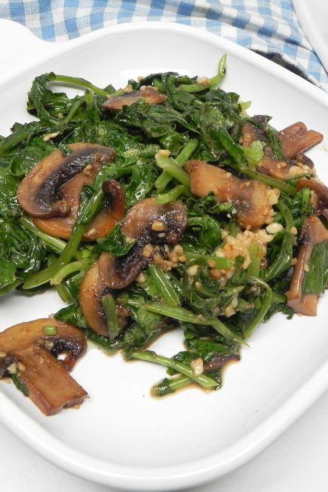 A quick and easy spring recipe for sauteed radish greens with mushrooms and garlic. Sauteed Spinach And Mushrooms, Best Spinach Recipes, How To Cook Radishes, Caramelized Mushrooms, Easy Spring Recipes, Spinach And Mushrooms, Radish Greens, Radish Recipes, Healthy Vegetable Recipes