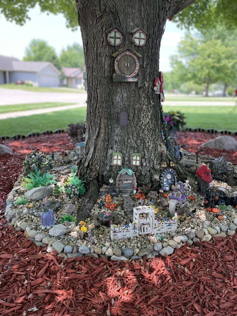 My Fairy Garden Created be me, Ronda 2023 Back side Fairy Garden Around A Tree, Tree Base Landscaping Ideas, Tire Fairy Garden, Knomes Garden Ideas, Fairy Garden Around Tree Base, Knomes Garden Diy, Small Fairy Garden Ideas, Tree Stump Fairy Garden, Fairy Garden Tree