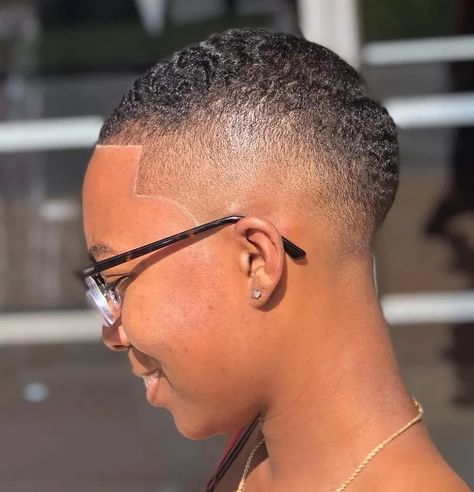 10 Must-Try Fade Haircuts for Black Women in 2024 Womens Short Haircut For Thinning Hair, Shadow Fade Haircut Black Women, Black Women Fades Haircuts, Bald Haircuts For Black Women, Black Women Haircut Styles Fade, Women Faded Haircut, Black Womens Fade Haircut Short Hair, Black Women Waves Haircut, Black Women Barber Haircut