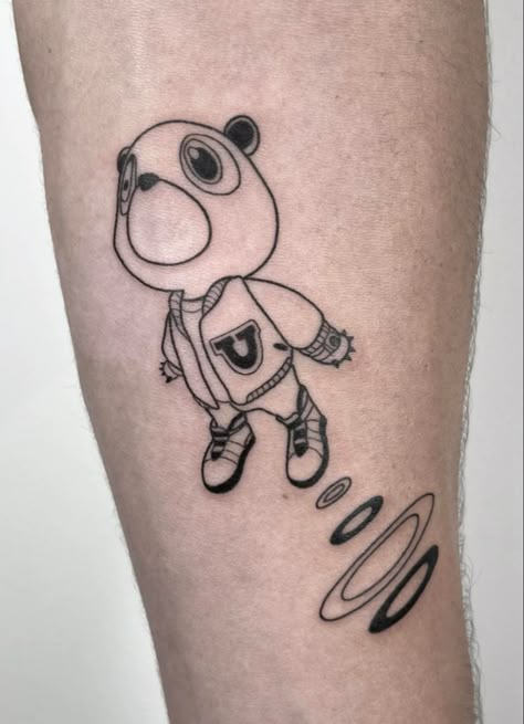 Rap Tatoos Ideas, Kanye West Graduation Bear Tattoo, Kanye West Graduation Tattoo, Runaway Tattoo Kanye, Kanye West Bear Tattoo, Kanye Bear Tattoo, Graduation Bear Tattoo, Polo G Tattoo, Kids See Ghosts Tattoo