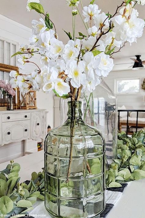 Glass Jugs Decor, Spring Wedding Centerpieces, Jug Decor, Cherry Blossom Branches, Glass Vase Decor, Vase Deco, Blossom Branch, Home Floral Arrangements, Cherry Blossom Branch