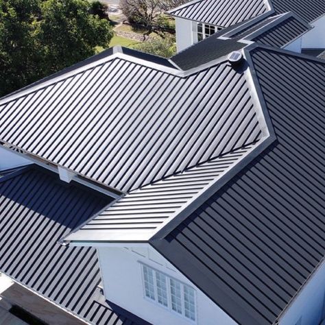 this image shoes a metal roof, shown from above. the roof is grey. Colorbond Cladding, Sheet Metal Roofing, Best Roofing, Roof Pitch, Roof Restoration, Leaky Roof, Brochure Design Layout, Corrugated Roofing, Commercial Roofing