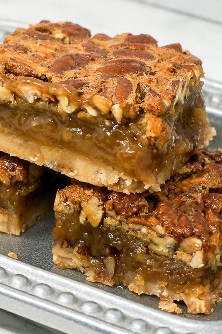 Pecan Pie Bars, adapted from Land 'O Lakes, starts with a shortbread crust that is topped with a rich brown sugar pecan filling. It's a great alternative Southern Sweet Potato Pie, Pecan Desserts Recipes, Chocolate Caramel Slice, Pecan Pie Bars Recipe, Pecan Filling, Sweet Potato Pie Southern, Pecan Desserts, Pecan Pies, Pie Bar Recipes