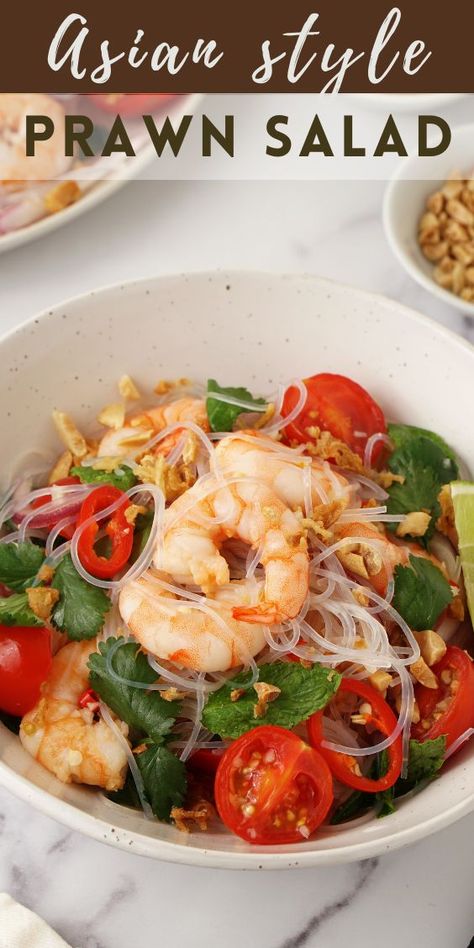 A white bowl filled with Asian style prawns salad consist of cooked prawns, tomatoes, mint  and coriander. Prawn Noodle Salad, Chilli Lime Dressing, Asian Prawn Salad, Prawns Salad Recipe, Cold Prawn Recipes, Prawn Salad Recipe Dinners, Thai Prawn Salad, Prawns Salad, Prawn Salad Recipe