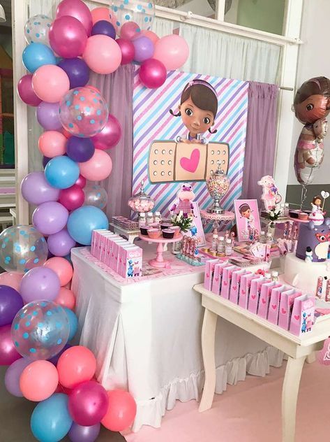 The dessert table at this Doc McStuffins birthday party is stunning! See more party ideas and share yours at CatchMyParty.com  #catchmyparty #partyideas #docmcstuffinsparty #docmcstuffinsdesserttable Dr Mcstuffins Birthday Ideas, Doc Mcstuffins Birthday Party Ideas Cake, Doc Mcstuffins Birthday Cake, Doc Mcstuffins Birthday Party Ideas, Doc Mcstuffins Cake, Doc Mcstuffins Birthday Party, Doc Mcstuffins Party, Doc Mcstuffins Birthday, Girl Birthday Themes