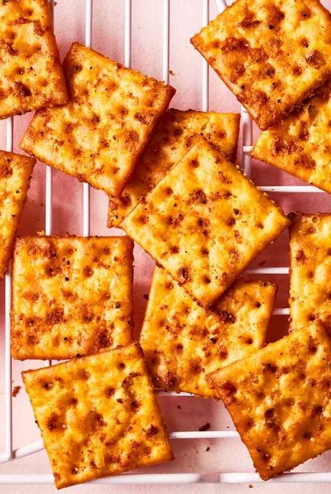 While saltines are classic for dipping into homemade chili or for scooping up Grandma’s famous chicken salad, they’re also a versatile ingredient that can be used in a variety of recipes. Use a sleeve of saltines to serve a variety of appetizers or transform them into Christmas toffee candy. Plus, it's likely one of those items that you always grab a box of at the store and have on hand in your pantry. Crumbled saltines are an awesome breading based for fried chicken and can even be made into a pie—there’s almost nothing they can’t do. #recipeideas #crackers #saltines #saltinecrackers #recipes Seasoned Saltines Recipe, Fried Saltine Crackers, Flavored Saltine Crackers, Saltine Cracker Recipes, Tailgate Wedding, Christmas Toffee, Nostalgic Recipes, Seasoned Crackers, Preserved Food