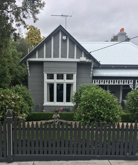 dark grey and white bay window Dark Grey Picket Fence, Grey Picket Fence, Carport Update, Gray And White House Exterior, Grey House White Trim, Dark Grey Houses, Grey Cottage, Picket Fencing, Grey Fences