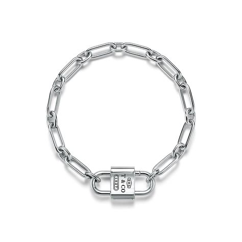 Proudly inscribed with the year Tiffany was founded, the Tiffany 1837® collection is defined by sleek curves and contours. This bracelet features a functioning lock which opens on both sides and adds a modern touch to this heritage-inspired design. Wear this bracelet by itself or pair it with other designs from the Tiffany 1837® collection. Sterling silver; Motif size, medium; Wrist size, double extra large; Fits wrists up to 7.75" | Tiffany 1837® Medium Double Lock Bracelet in Sterling Silver, Tiffany Bracelet, Lock Bracelet, Tiffany Bracelets, Double Lock, Tiffany And Co, Girly Jewelry, Christmas Wishlist, Tiffany & Co., Silver Bracelets