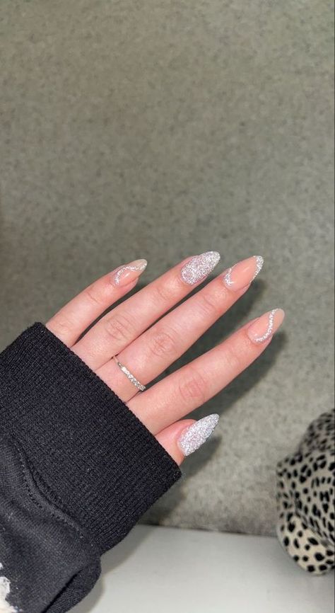 Graduation Nails Ideas 2023 Almond, Wedding Nails Bridesmaid Acrylic Almond, Holiday Nail Inspo Summer White, Almond Nails Designs Graduation, Prom 2023 Nails, Grad Nails White, White And Glitter Acrylic Nails, White Nails With Designs Glitter, Almond Nails Prom