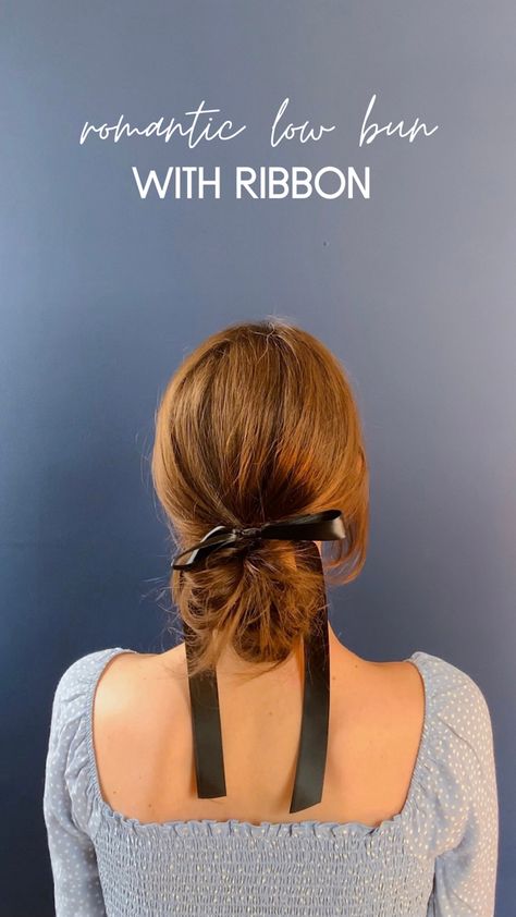 Brunette with hair in low bun with black ribbon bow Low Bun Ribbon, Hair Bun With Ribbon, Low Bun With Ribbon, Bridesmaid Hair With Ribbon, Ribbon Bun Hairstyle, Low Bun With Bow, Bun With Ribbon, Romantic Low Bun, Bun With Bow