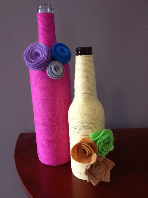 Yarn-Wrapped Bottles with Felt Flowers Yarn Wrapped Bottles, Wrapped Bottles, Bottle Wrapping, Autumn Decor, Crafts For Teens, Felt Flowers, Bag Bag, Bottles Decoration, Fall Decor