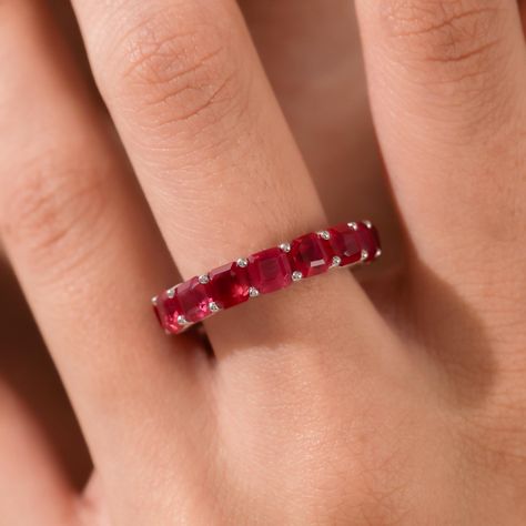 14K Ruby Wedding Ring, Gold Eternity Ring, Stackable Ring, Ruby Engagement Ring, Gemstone Ring, Ruby Ring, Birthstone Ring This classic, dainty wedding band features beautiful Asscher cut ruby Gemstone set on a solid gold band. The ring is available in 14K or 18K yellow, white and rose gold. ★ 𝗚𝐞𝐦𝐬𝐭𝐨𝐧𝐞 𝐃𝐞𝐭𝐚𝐢𝐥𝐬 ✧ Shape: Asscher ✧ Diamond Weight: 3.30 CT - 8 CT (varies as per mm size) ✧ Stone Type: Lab Created Gemstone ✧ Gemstone Clarity: AAA Grade  ✧ Gemstone Color: Red ★ 𝐑𝐢𝐧𝐠 𝐃𝐞𝐭𝐚𝐢𝐥𝐬  ✧ Made-To-Order ✧ Metal Type: Solid Gold ✧ Metal Purity: 14K Solid Gold, 18K Solid Gold ✧ Metal Tone: Yellow Gold, White Gold, Rose Gold ✧ Setting Type: Prong ✧ Band Width Option: 3 mm, 4 mm, or 4.5 mm ✧ Band Thickness: 2.70 mm - 3.85 mm(varies as per mm size) ✦ 𝐍𝐨𝐭𝐞: To ensure t