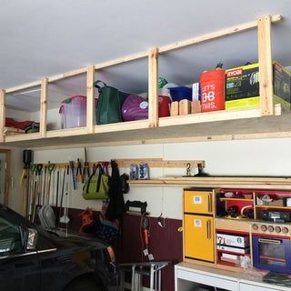 Wasted Space: High Garage Storage Shelves : 8 Steps (with Pictures) - Instructables Diy Overhead Garage Storage, Garage Storage Plans, Easy Garage Storage, Garage Ceiling Storage, Garage Wall Storage, Garage Storage Inspiration, Garage Organisation, Roof Storage, Garage Workshop Organization