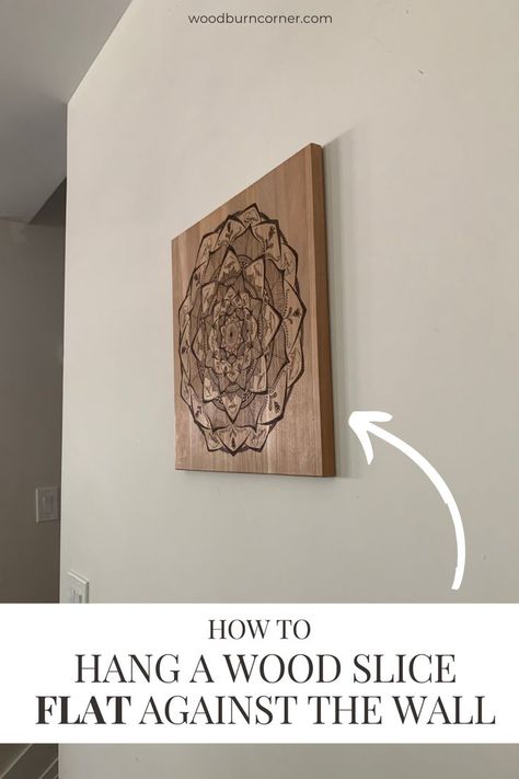 a large square wood slice hanging flat against the wall. Wood Slice Art, Pyrography Art, Keyhole Hanger, Easy Wood, How To Hang, Wood Burning Art, Wood Slices, A Wood, Pyrography