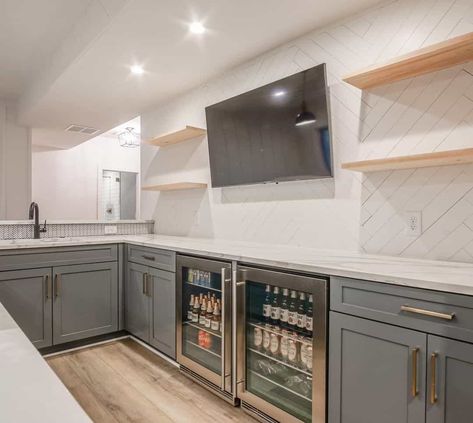 Basement Bar Grey Cabinets, Basement Wrap Around Bar Ideas, Wall Bar Basement, White Cabinet Wet Bar Ideas, Small Basement Wet Bar With Full Size Fridge, Basement Bar U Shape, Shiplap Wall In Basement, Neutral Finished Basement, Finished Basement Wet Bar