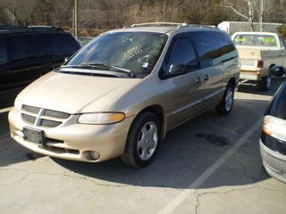 Our first minivan was a gold Dodge Caravan. Dodge Minivan, Minivan Aesthetic, Courtandnate Van, Minivan Camper Conversion Dodge Caravan, Minivan Camper Conversion Honda Odyssey, Dodge Caravan Minivan, Dodge A100 Van, Minivan, Potty Mouth